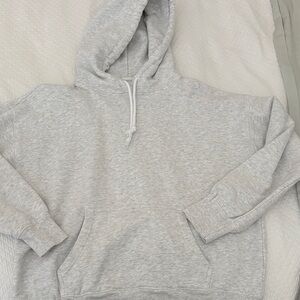Cute NIA Gray Hoodie Sweater with white draw strings!